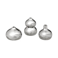 Set of three silver decorative vases with smooth, glossy finishes and unique, organic shapes.