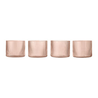 Set of four rose gold ribbed planters with a sleek, modern design. Perfect for contemporary home decor accents.