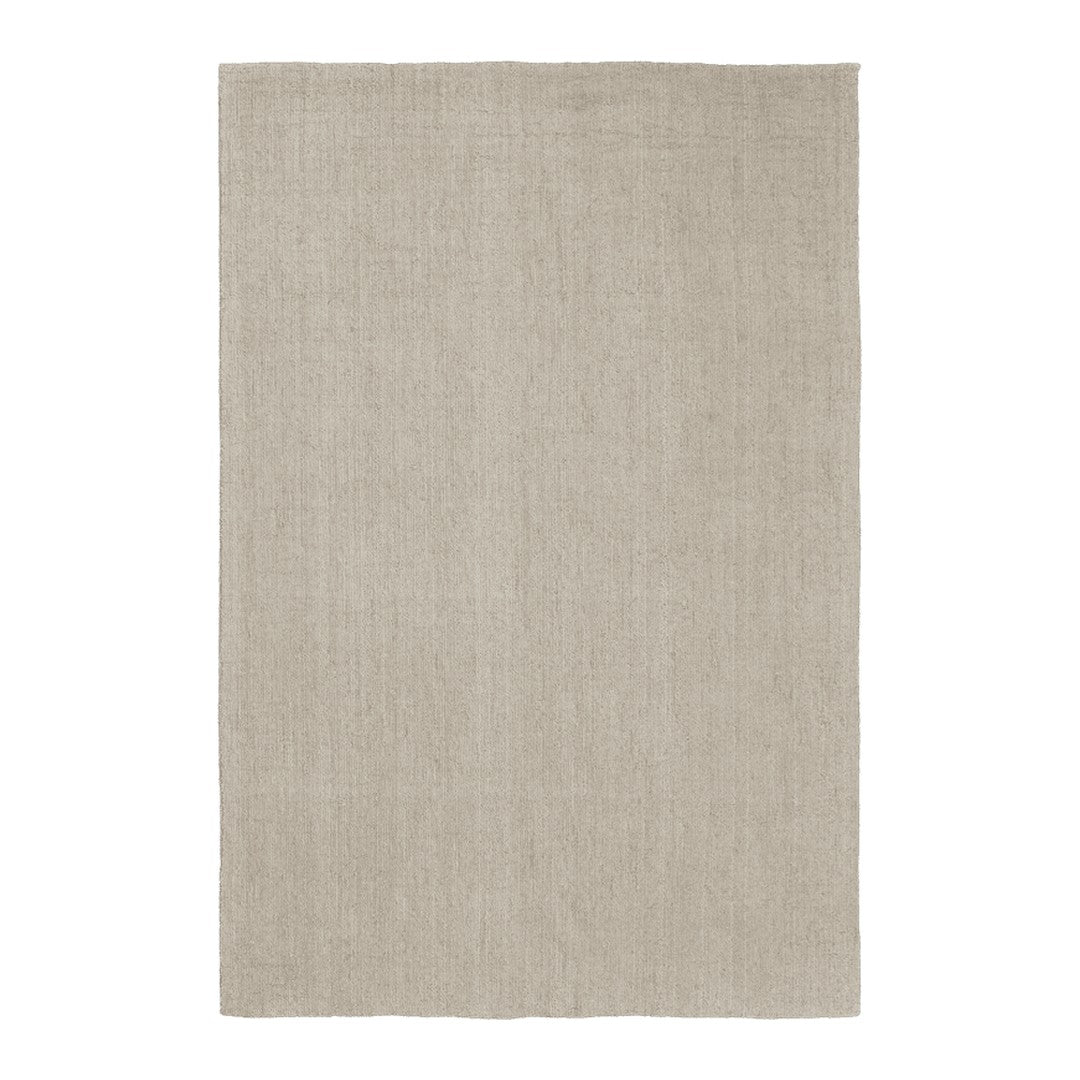 Beige textured rug with a subtle woven pattern, perfect for adding warmth to any space.