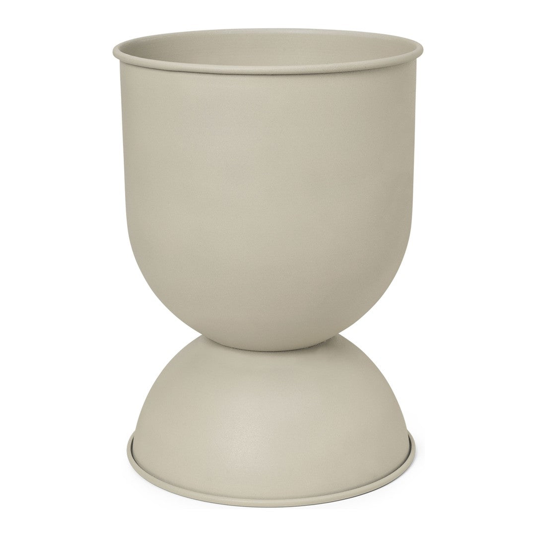 Beige ceramic planter with a smooth, matte finish and a modern hourglass shape. Ideal for any decor style.