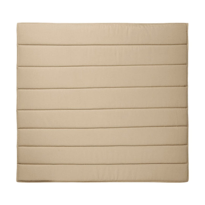 Beige quilted square cushion with subtle horizontal stripes, adding texture and warmth to any space.