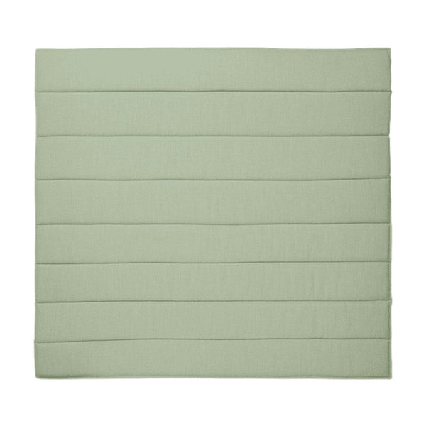 Light sage green square cushion with horizontal stitched lines pattern. Soft texture adds a subtle elegance.
