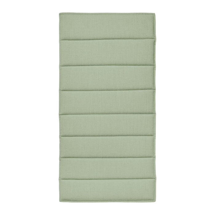 Light green padded mat featuring horizontal stitched patterns for added comfort and style.