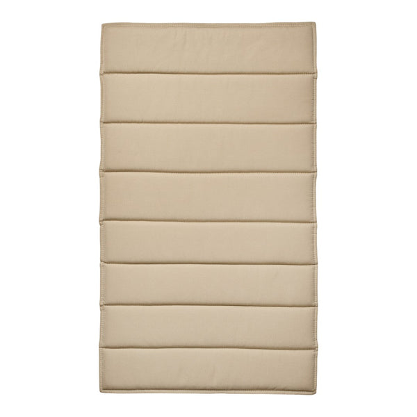 Beige padded mat with subtle quilted pattern and horizontal stitched lines for a sleek, modern look.