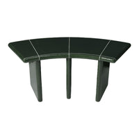 Curved green table with sleek black accents and a glossy finish, perfect for modern decor.