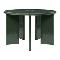 Round green dining table with a glossy finish and sleek geometric design. Perfect for modern interiors.
