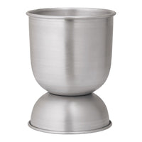 Brushed stainless steel cup with a sleek, modern design; smooth, reflective finish and subtle curves.