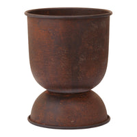 Rustic brown planter with a textured finish and a rounded base. Ideal for adding a vintage touch to your decor.