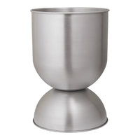 "Brushed silver stainless steel cup with a sleek, modern design and a smooth, matte finish."