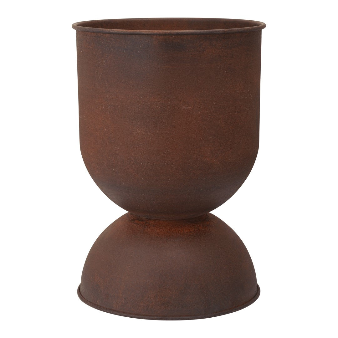 Rust-colored metal planter with a smooth, matte finish and a rounded base design. Perfect for modern decor.