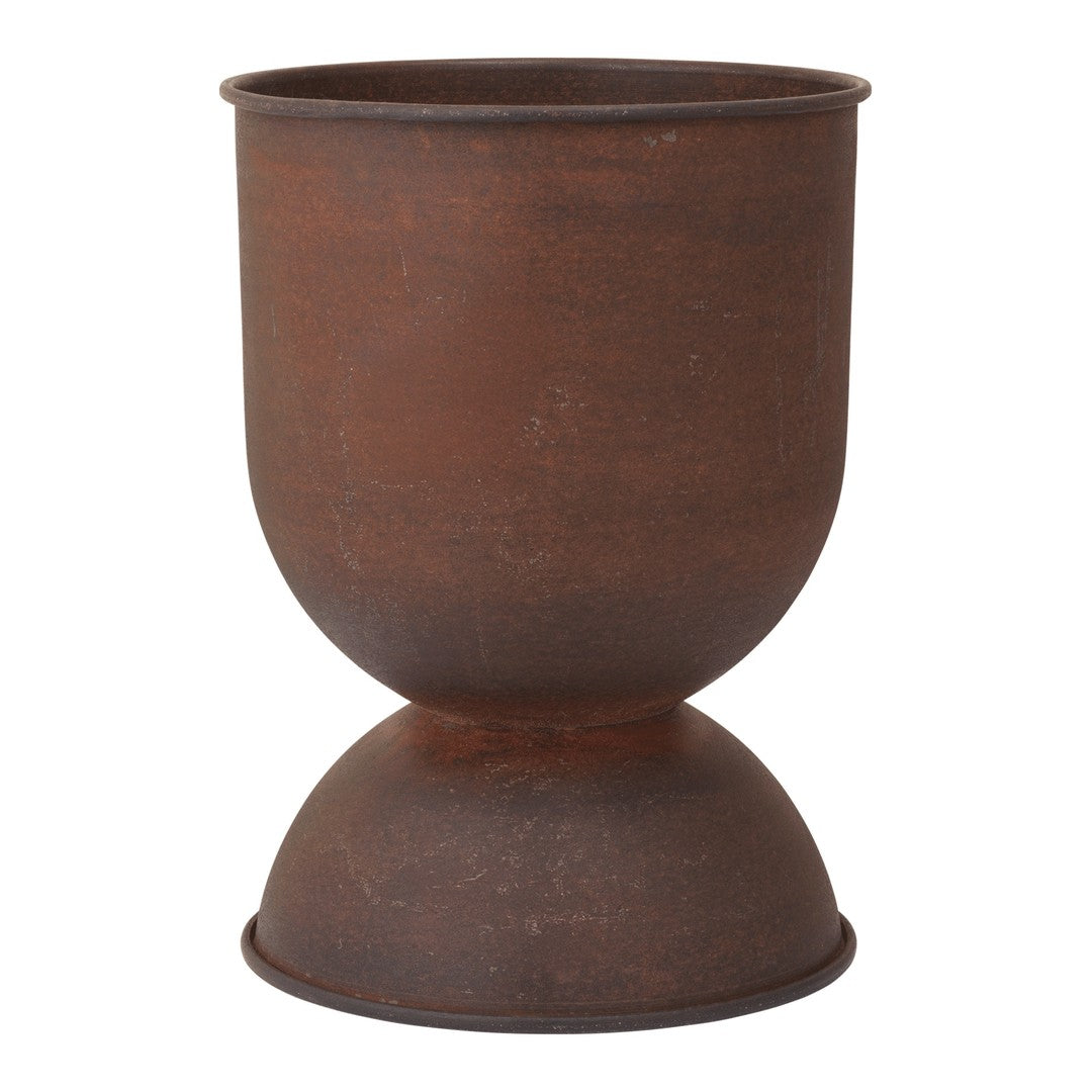 Rust-colored metal planter with a smooth finish and a unique hourglass shape. Ideal for modern decor.