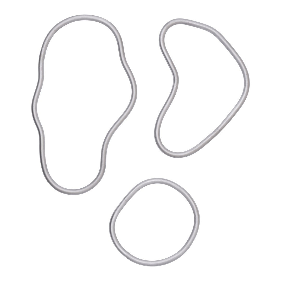 Three silver rubber bands in varying organic shapes and sizes, showcasing a sleek, minimalist design.