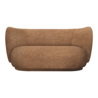 Soft brown textured sofa with a smooth, rounded design and plush fabric offering a cozy, modern look.