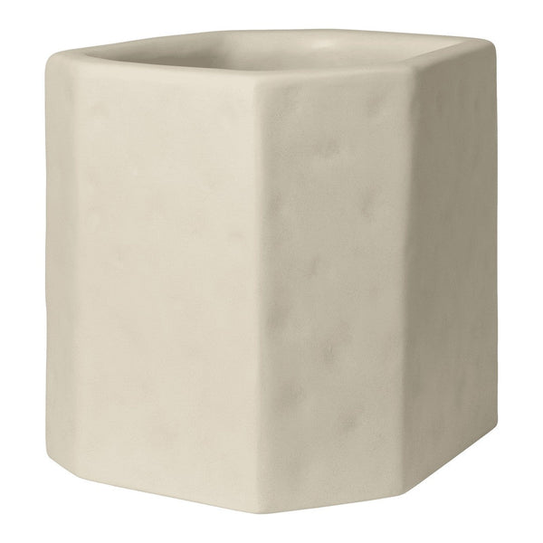 Light beige ceramic planter with a textured, matte finish and geometric shape. Ideal for modern decor.