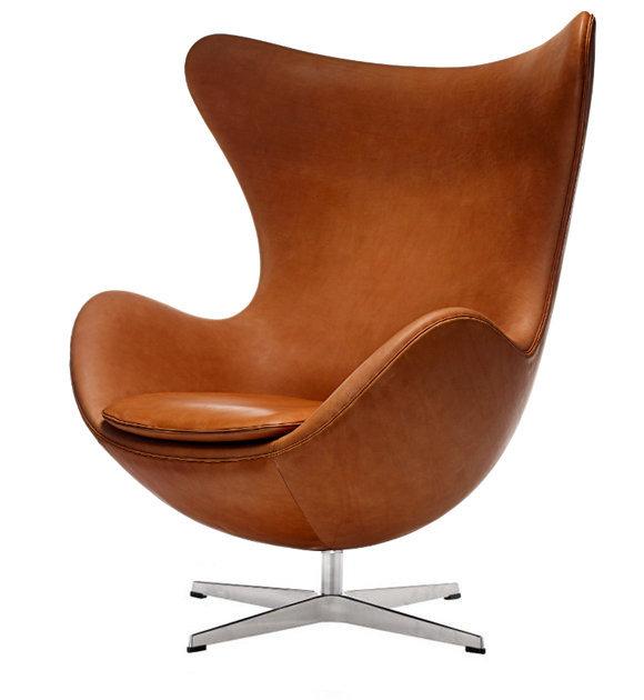Stylish brown leather chair with a unique curved design, featuring a sleek silver base. Perfect for modern decor.