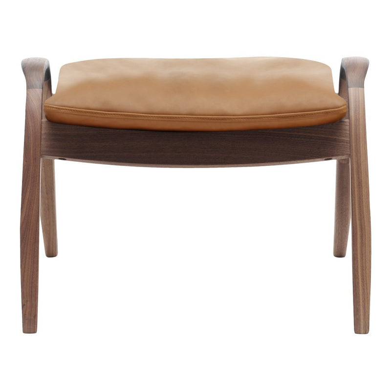 Light brown cushion on a dark wooden frame with smooth, clean lines. Modern and minimalist design.