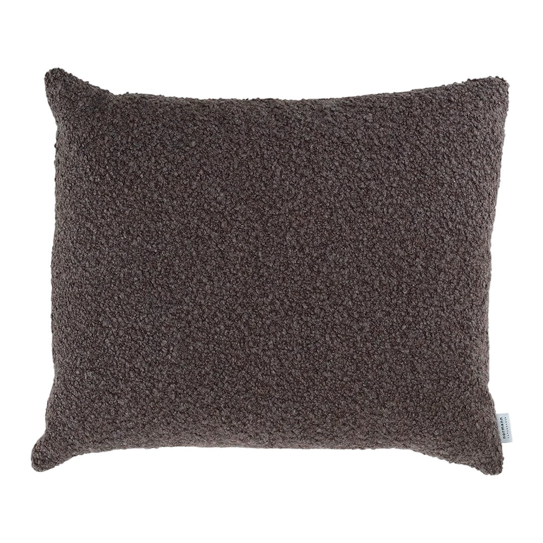 Dark brown textured throw pillow, featuring a soft, cozy fabric with a plush feel. Perfect for home decor accents.