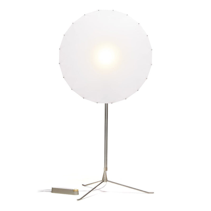 Sleek white circular lampshade with a minimalist metal base, perfect for modern decor.