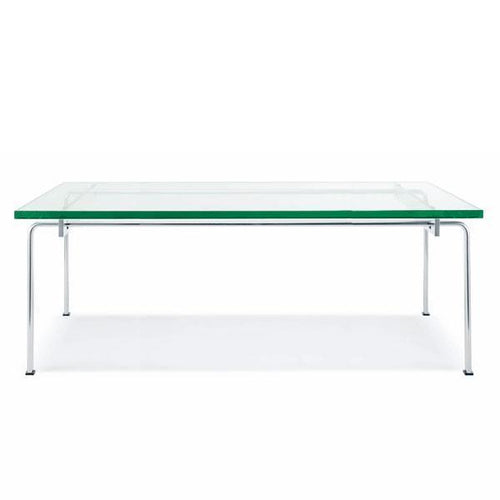 Clear glass coffee table with green-edged top and sleek chrome legs against a white background.