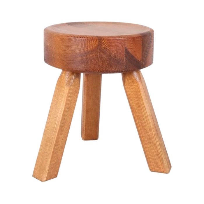Round wooden stool with natural wood finish and light, smooth legs. Ideal for modern and rustic decor.
