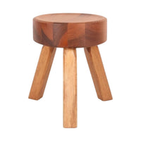 Round wooden stool with a warm brown top and light wooden legs, showcasing smooth, natural patterns.