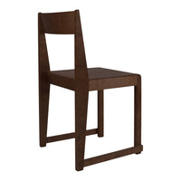 Dark brown wooden chair with a minimalist design and sleek lines, featuring a smooth, solid finish.