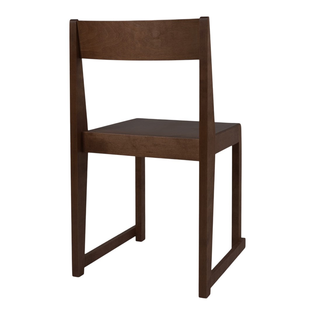 Solid dark brown wooden chair with a simple, minimalist design and smooth finish. Ideal for modern decor.