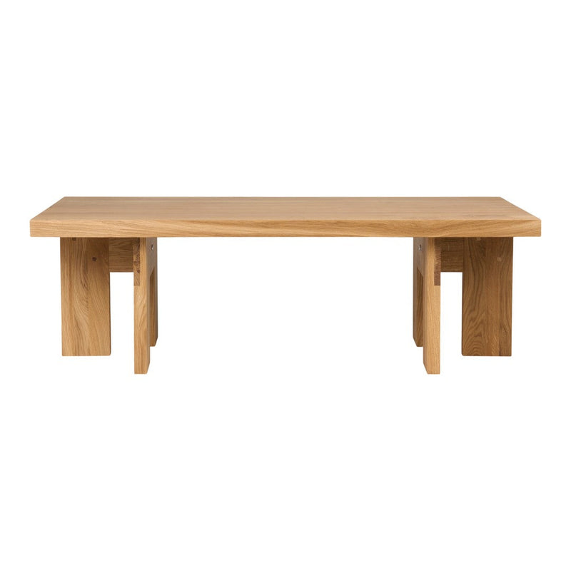 Light oak coffee table with a simple, clean design and smooth surface, featuring natural wood grain patterns.