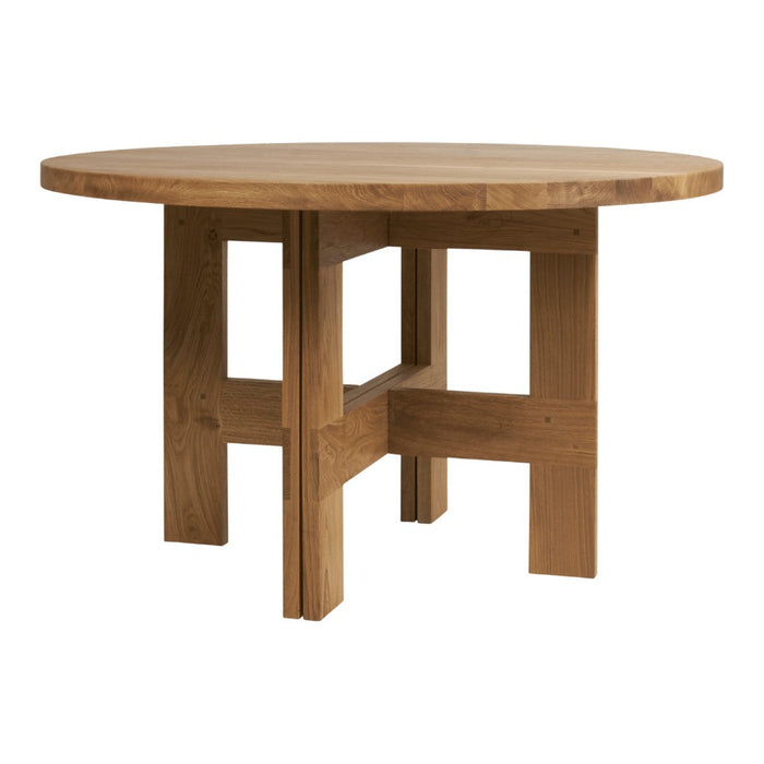 Round wooden dining table with a natural oak finish and simple geometric pattern in its base. Ideal for modern interiors.