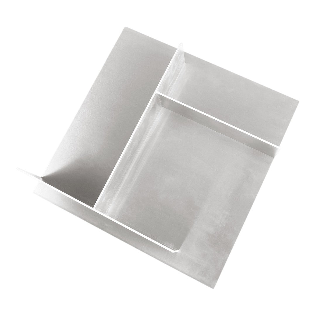 Modern silver stainless steel serving tray with sleek, minimalist design and angular patterns. Perfect for stylish dining.