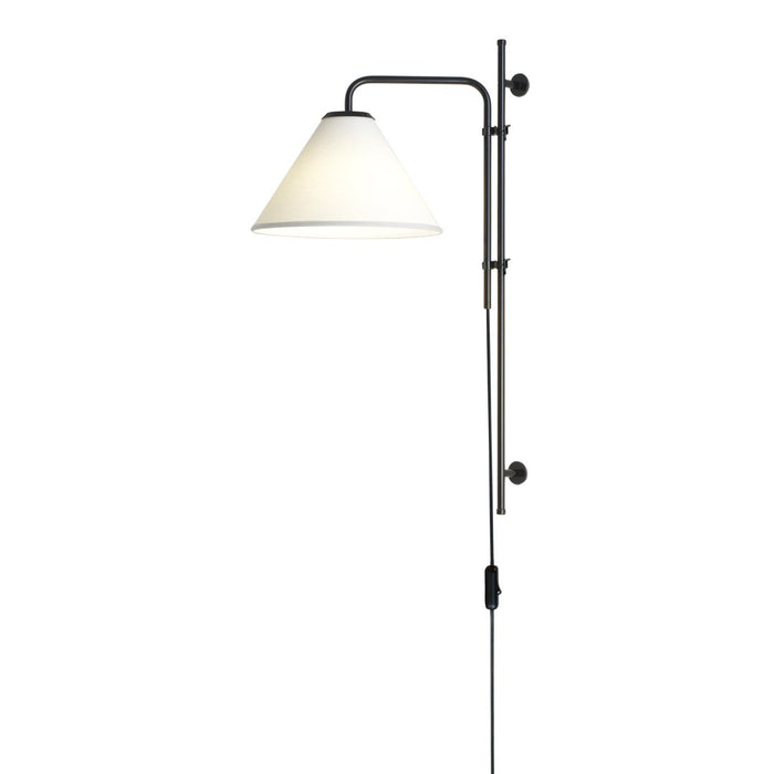 Modern wall lamp featuring a sleek black metal frame and a contrasting white conical shade.