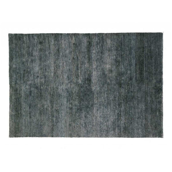 Textured area rug in shades of gray with subtle variations and abstract pattern. Ideal for modern decor.