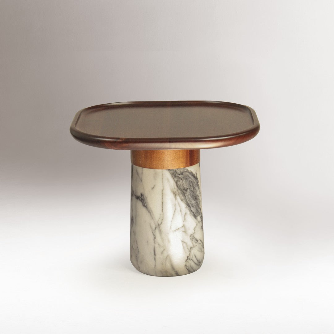 Square table with a dark wood top, gold accent, and a white marble base featuring grey veining patterns.