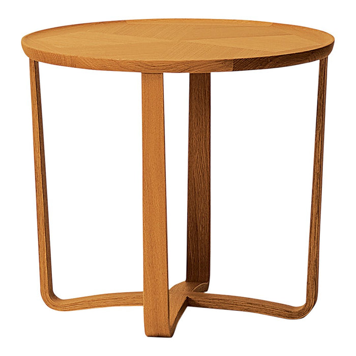 Round wooden side table in light oak finish with a minimalist design and smooth, natural grain pattern.