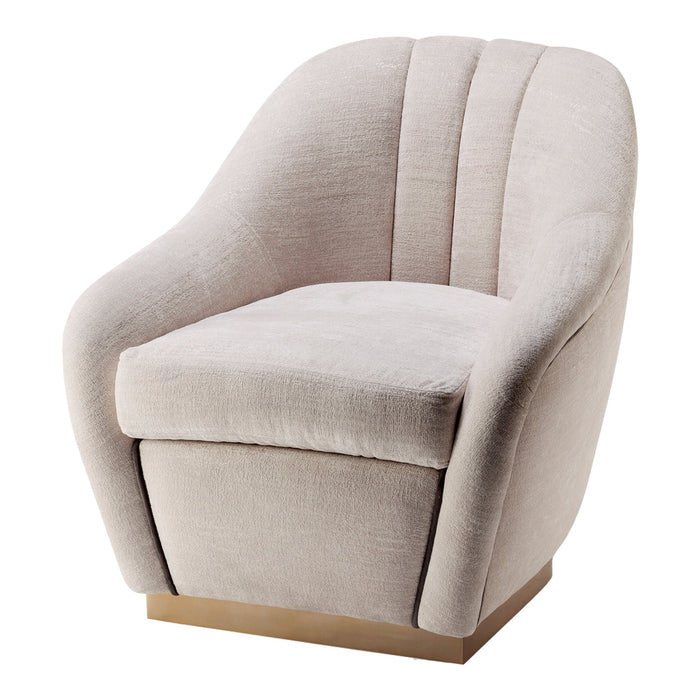 Blush pink upholstered chair with subtle texture and curved design, accented by a gold base. Ideal for modern decor.