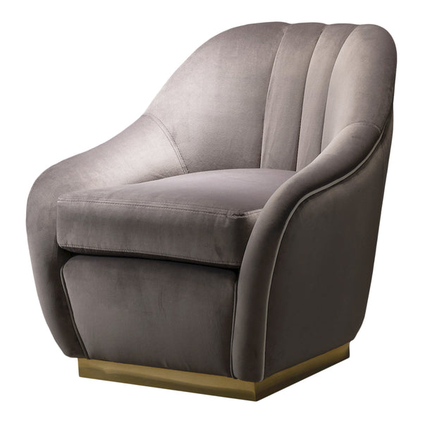 Sleek gray velvet armchair with soft contours and a gold base, perfect for modern decor.