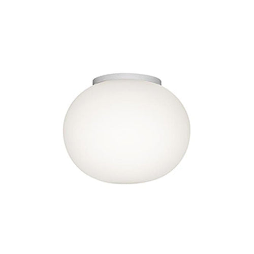 Round, frosted white glass ceiling light with a sleek silver mount, perfect for modern decor.