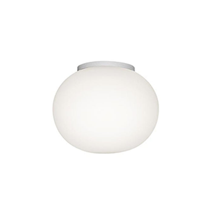 Round, frosted white glass ceiling light with a sleek silver mount, perfect for modern decor.