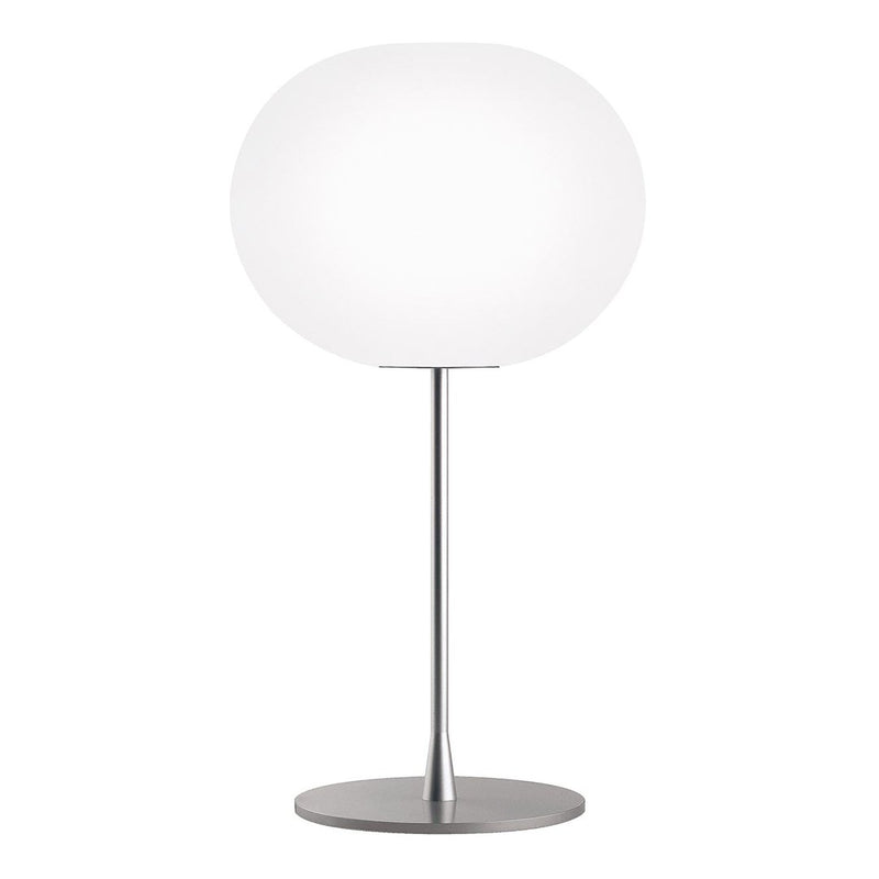 Modern table lamp with a smooth white globe and sleek silver base, perfect for minimalistic decor.