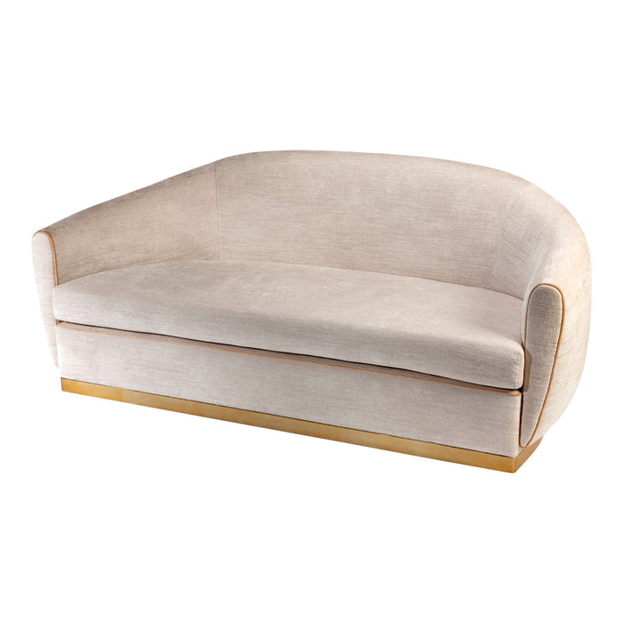 Beige upholstered sofa with a smooth texture and gold accents. Elegant and modern design for stylish interiors.