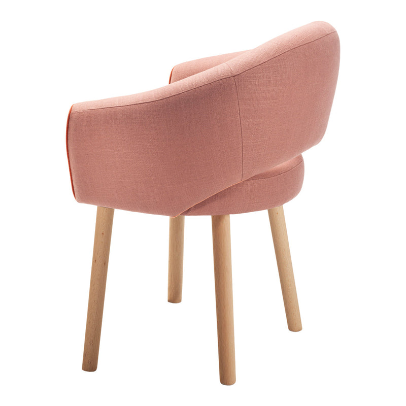 Pink upholstered chair with a textured fabric and natural wood legs, showcasing a modern design.