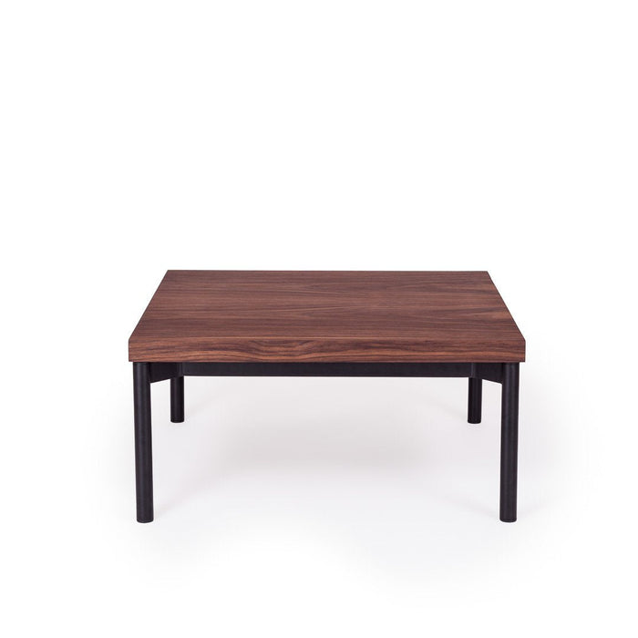 Square coffee table featuring a rich brown wooden top with subtle grain patterns, supported by sleek black metal legs.