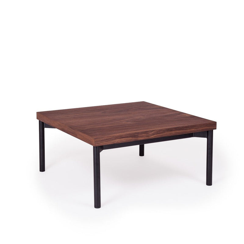 Brown wooden square coffee table with a smooth surface and black metal legs on a white background.