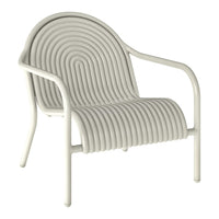 White lounge chair with a stylish, curved stripe pattern, featuring a modern and minimalistic design.