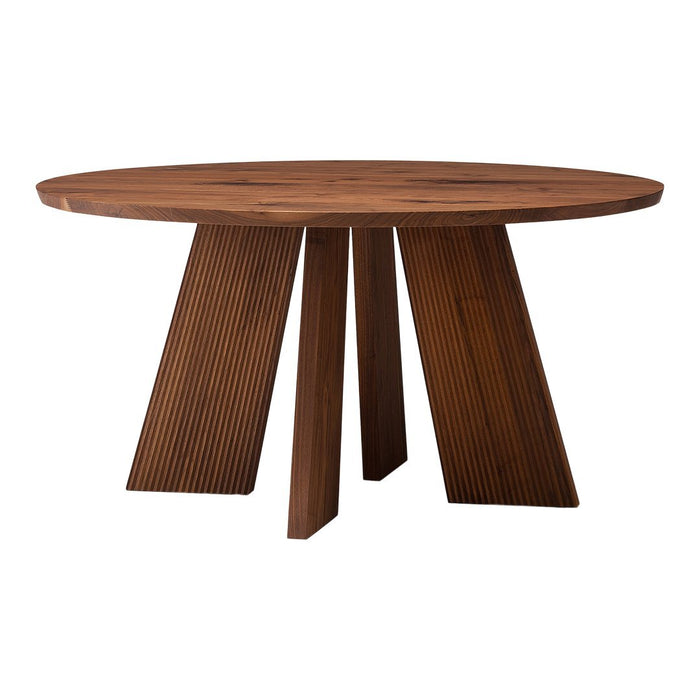 Round wooden table in rich brown color with textured legs and a smooth, circular top. Ideal for modern dining.