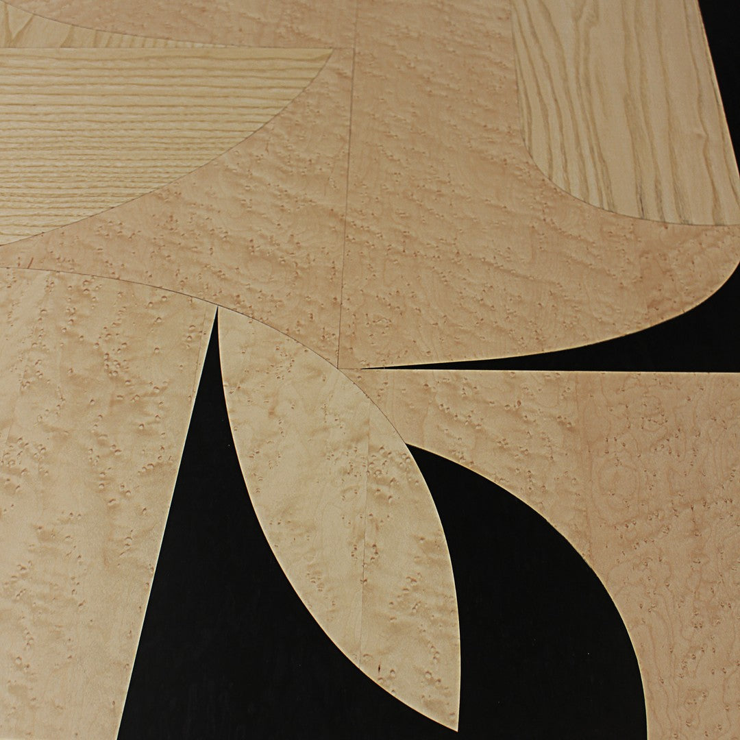 Natural wood tones with black geometric patterns, featuring smooth curves and sharp angles for a modern aesthetic.