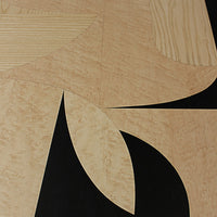 Natural wood tones with black geometric patterns, featuring smooth curves and sharp angles for a modern aesthetic.