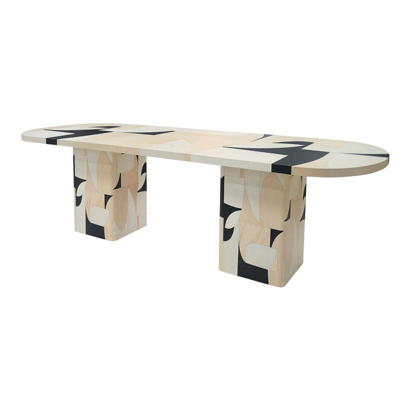 Multi-colored geometric dining table featuring soft beige, black, and white patterns. Modern art-inspired design.