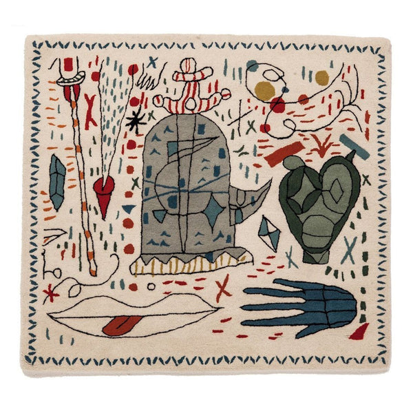 Colorful patterned rug featuring abstract designs in blue, red, green, and cream tones with whimsical motifs.
