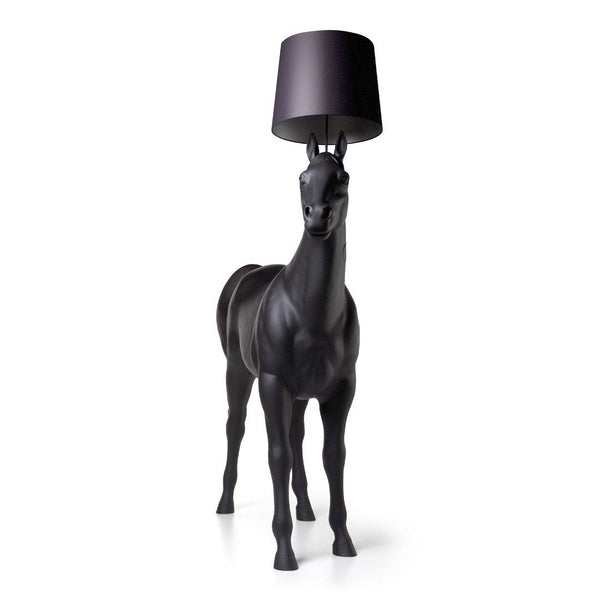 Black giraffe lamp with a purple shade, featuring a sleek, modern design. Perfect for unique home decor.